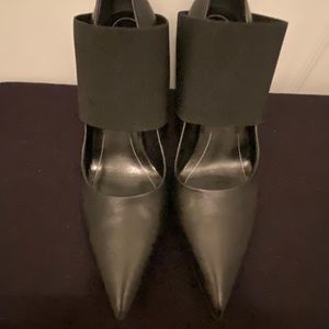 Black Balenciaga strap heels.